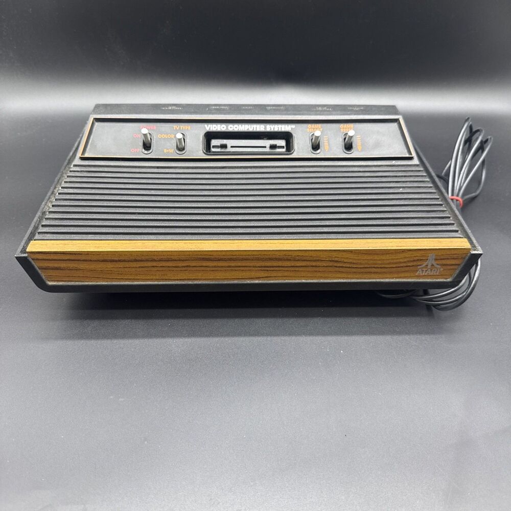 Atari 2600 CX-2600A Wood Grain 4 Switch Console untested Works for Parts/Repair